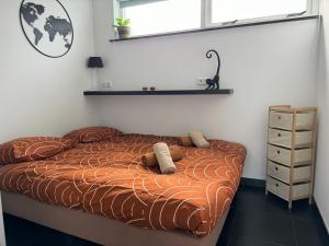 Postel nebo postele na pokoji v ubytování Vakantiewoning aan de Kust 16