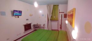TV a/nebo společenská místnost v ubytování Guesthouse Serena