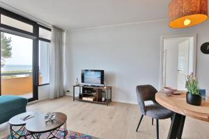 TV a/nebo společenská místnost v ubytování Berliner Hof Berliner Hof Appartement 116