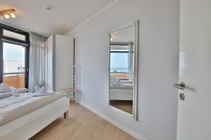 Postel nebo postele na pokoji v ubytování Berliner Hof Berliner Hof Appartement 116