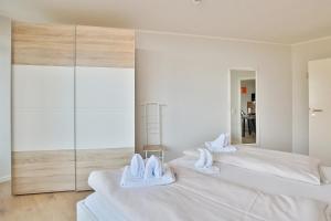 Postel nebo postele na pokoji v ubytování Berliner Hof Berliner Hof Appartement 116