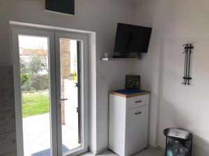 Dapur atau dapur kecil di Apartments Samardzic