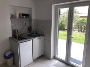 Dapur atau dapur kecil di Apartments Samardzic