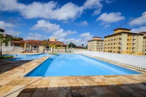 a swimming pool on the roof of a building at Lar Botticelli 2Quartos wifi piscina ArCond in Ananindeua