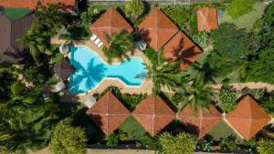 an overhead view of a house with a swimming pool at Pousada Berro do Jeguy in Pipa