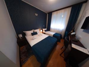 Letto o letti in una camera di Motel Krnjevo