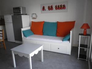 Ein Sitzbereich in der Unterkunft Appartement Face à la Mer 1 étoile