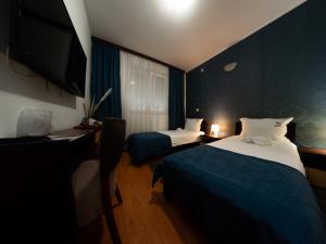 Letto o letti in una camera di Motel Krnjevo