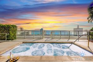 a hot tub on the roof of a building at Amazing Pool - Gym - Hot Tub - Near Beach in Hollywood +42 photos