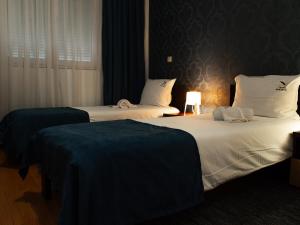 Letto o letti in una camera di Motel Krnjevo