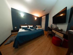 Letto o letti in una camera di Motel Krnjevo