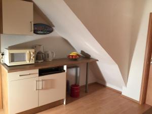Kuchyň nebo kuchyňský kout v ubytování Appartements Funk
