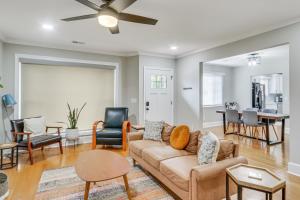 a living room with a couch and chairs at Updated Columbia Home with Patio - 4 Mi to USC! in Columbia