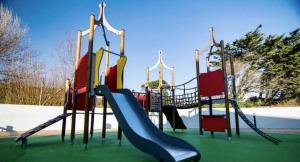 a playground with a slide and a slide at Newquay Bay Resort Sandy Toes - Hosting up to 6 in Newquay