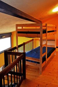 Двухъярусная кровать или двухъярусные кровати в номере Cà dei Conti
