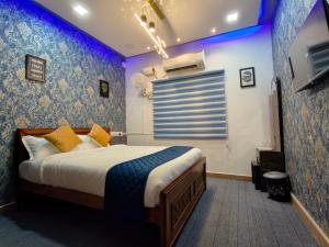 Säng eller sängar i ett rum på Sunshine Villa & Homestay