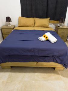 En eller flere senge i et værelse på Casa Ámbar