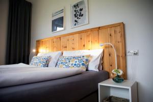 Postel nebo postele na pokoji v ubytování Schneckenhaus Dachstein West