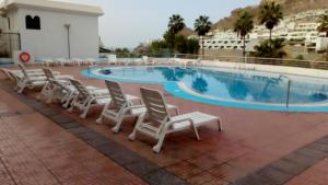 Bazén v ubytování Residencial Sol Suite 2 nebo v jeho okolí