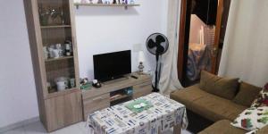 TV a/nebo společenská místnost v ubytování Residencial Sol Suite 2
