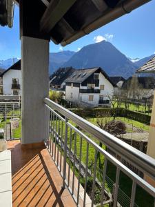 a balcony with a view of a mountain at Apartment with balcony Hiša Brdo 48 in Bovec