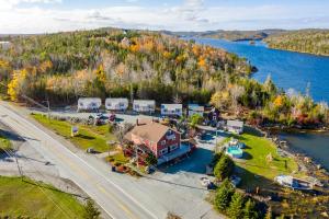 an aerial view of a house on an island in a river at Jeddore Lodge in Head of Jeddore