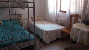 Katil dua tingkat atau katil-katil dua tingkat dalam bilik di Alquile vacacional grupos