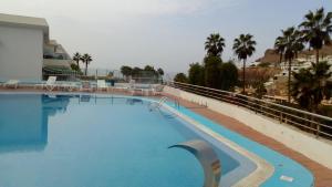 Bazén v ubytování Residencial Sol Suite 2 nebo v jeho okolí