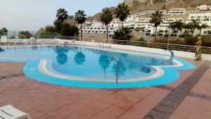 Bazén v ubytování Residencial Sol Suite 2 nebo v jeho okolí