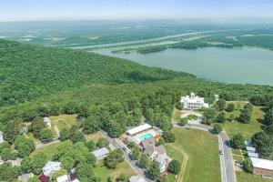 an aerial view of a house and a lake at Quiet Getaway at Wayward Cottage in Pisgah