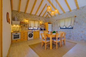Gallery image of Pegasus stone house in Yaka +14 photos