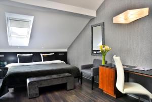 Postel nebo postele na pokoji v ubytování Ametyst Hotel Praha