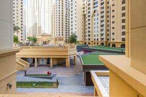 a view of a city with tall buildings at Frank Porter - Rimal 3 in Dubai