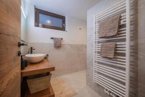 a bathroom with a sink and a shower at Apartment Michael in Neustift im Stubaital