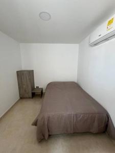 Postel nebo postele na pokoji v ubytování Apto 301 cerca a C.C. unicentro