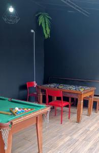 Billardbord på Tá em Casa Peruíbe