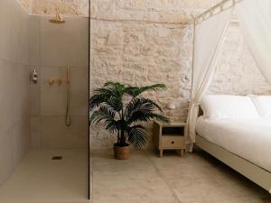 Postel nebo postele na pokoji v ubytování Aurluna Luxury Suites