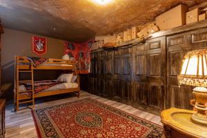 a bedroom with a bunk bed and wooden walls at Stay at Hogwarts Harry Potter's Home, Free Parking, Pets Allowed in Kissimmee