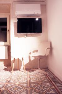 TV i/ili multimedijalni sistem u objektu Cove 532 by Savynomad Harbour Residences wow View