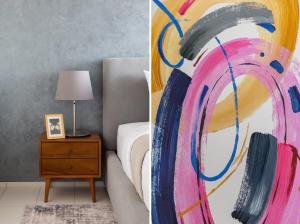 a bedroom with a painting of a bed and a table with a lamp at Frank Porter - Index Tower in Dubai