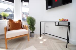 Et tv og/eller underholdning på Centrally Located 2 Bedroom