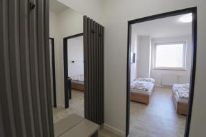 Postel nebo postele na pokoji v ubytování Penzion Tenis Klub DEZA