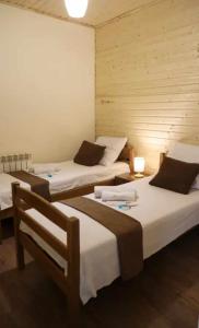 a room with three beds in a room at OldByurakan Villa in Byurakan