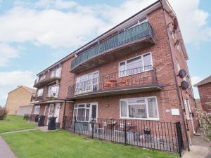 an apartment building with balconies on the side of it at The Upper Circle in Clacton-on-Sea