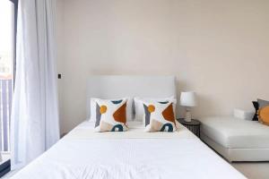 Postel nebo postele na pokoji v ubytování Frank Porter - Beverly Residence