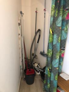 a room with a bunch of gardening tools in it at Très beau studio près de la mer aux Issambres in Les Issambres