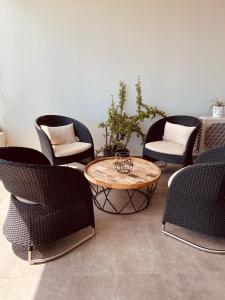 Posezení v ubytování Meherio - Bel Appartement vue mer à TAHITI