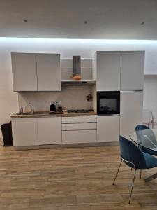 Η κουζίνα ή μικρή κουζίνα στο Casa Vacanze Aenaria 2