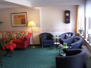 Ein Sitzbereich in der Unterkunft Mein Vierjahreszeiten Hotel Garni Superior