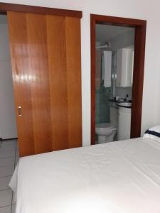 Кровать или кровати в номере Sudoeste H215